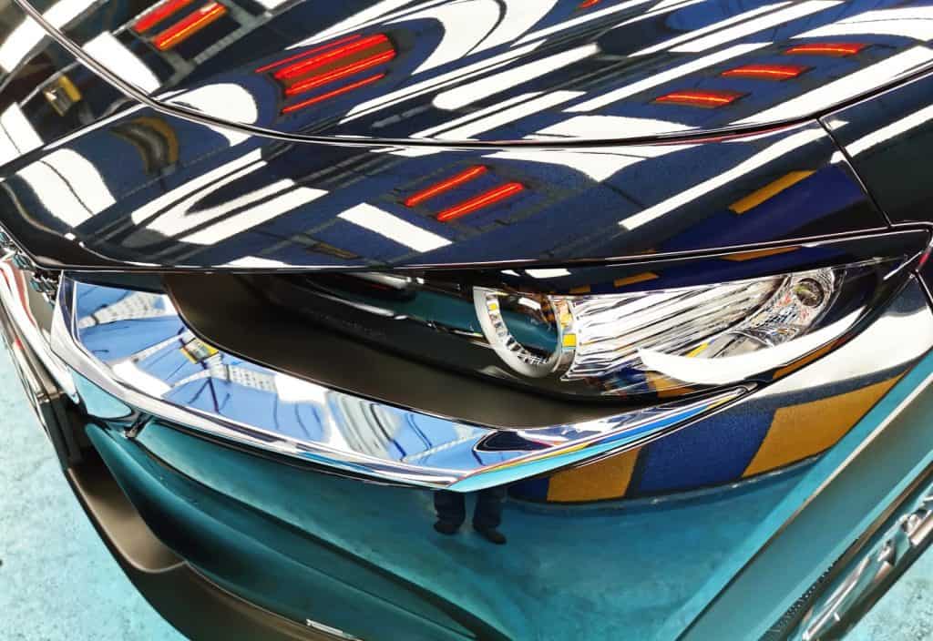The CX-3's coated paintwork showing clean reflections.