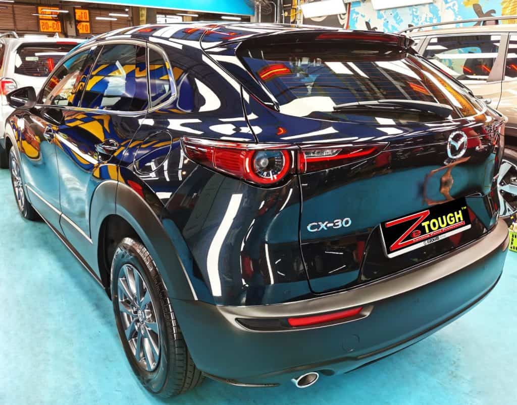 Rear quarter of the Mazda CX-3, glossy and protected.