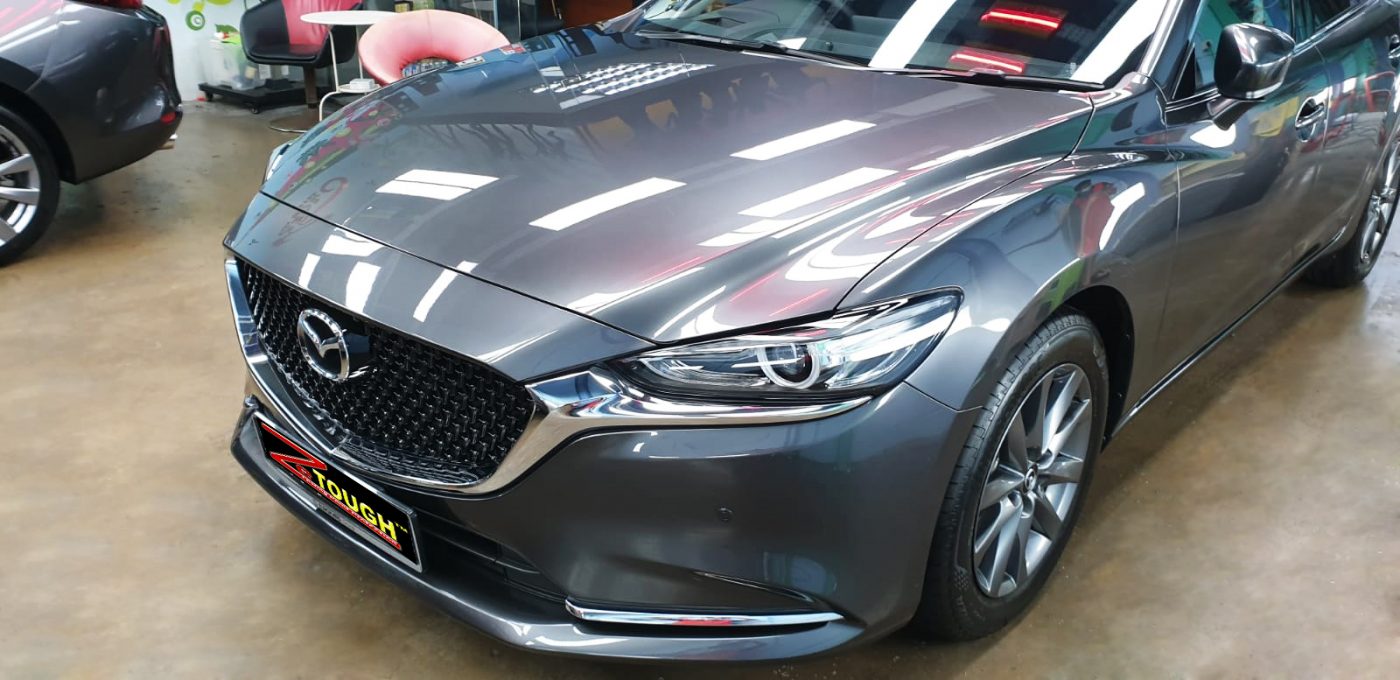 The Mazda 6 from a side angle after the ceramic coating.