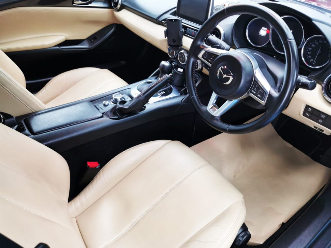 The MX-5 parked in the workshop, freshly coated.