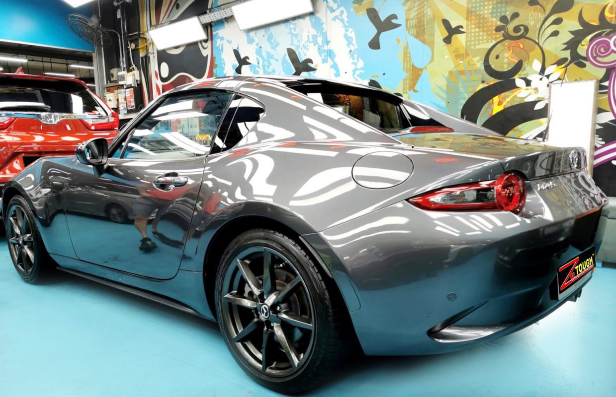 Rear quarter of the MX-5, glossy and protected.