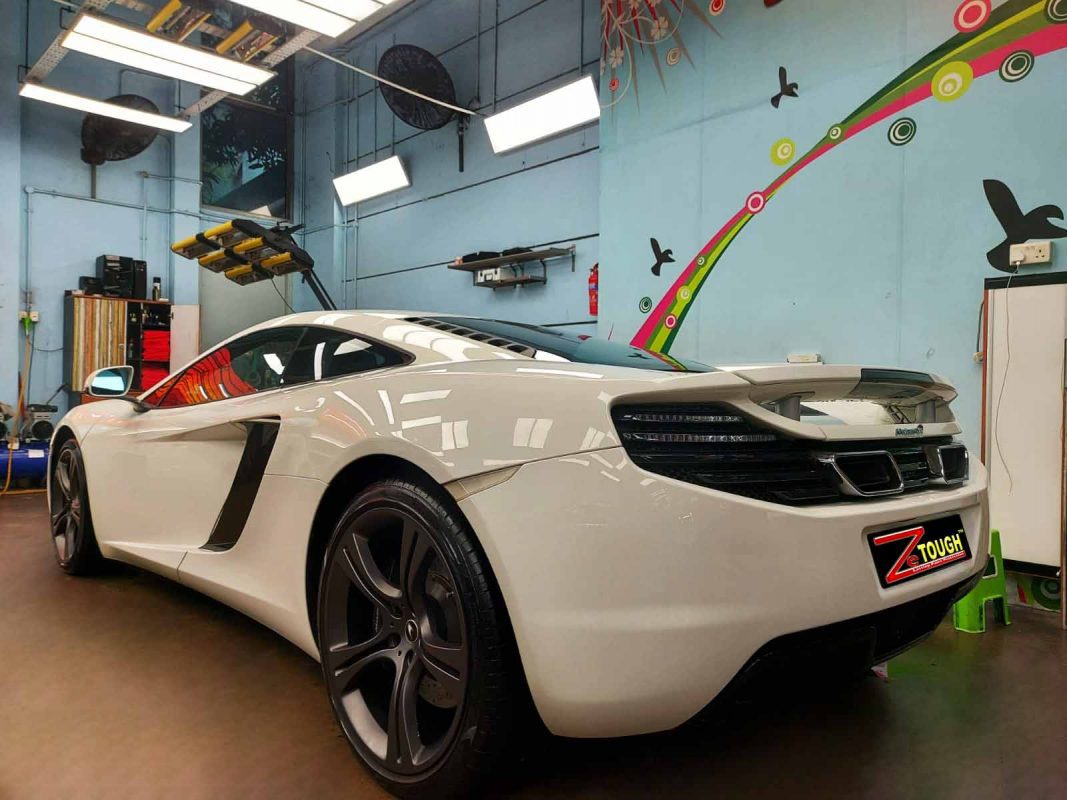 Front three-quarter view of the McLaren MP4 after coating.