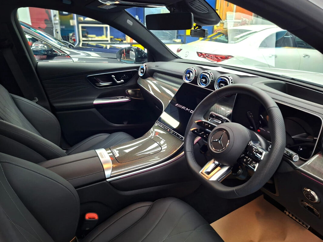Reflections across the coated panels of the Mercedes-AMG GLC 43.