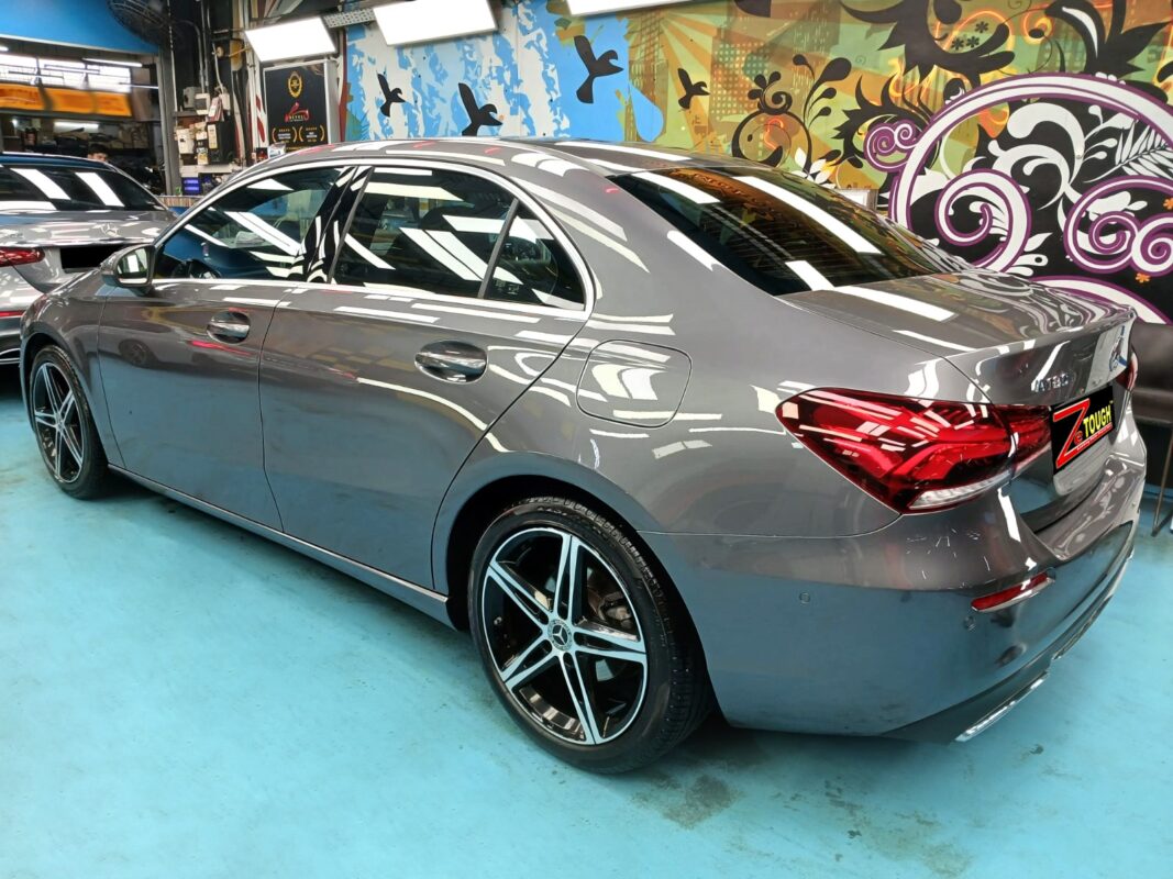 Rear quarter of the Mercedes-Benz A180, glossy and protected.