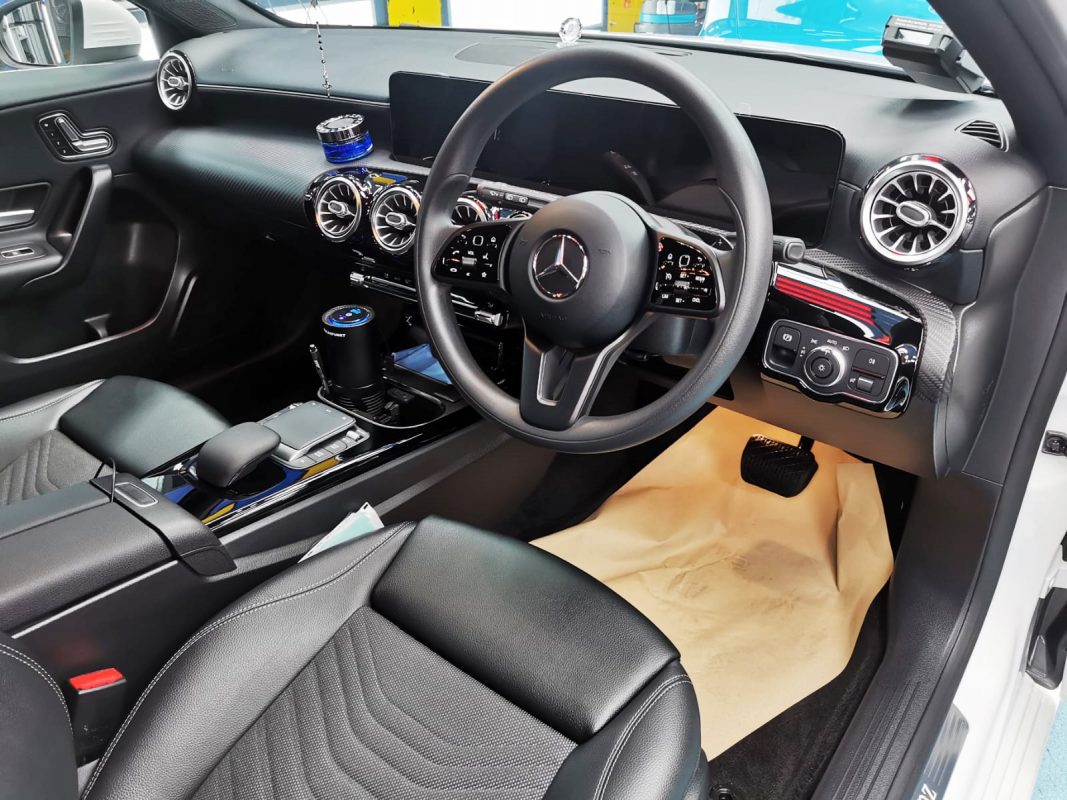The Mercedes-Benz A180 parked in the workshop, freshly coated.