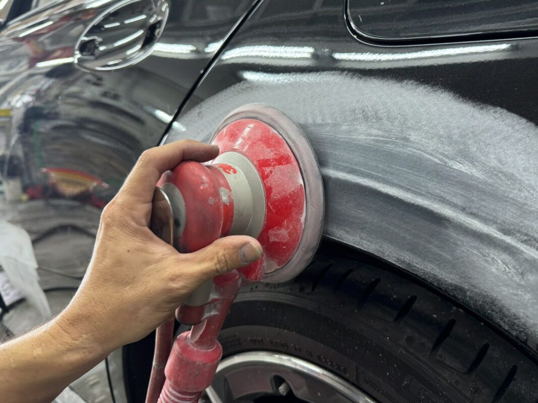 Bodywork check on the A180, identifying scratches, dents, and areas needing repair.