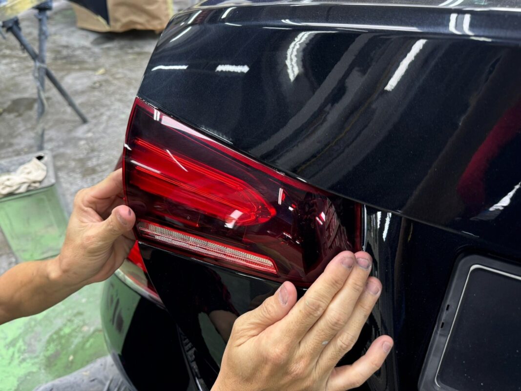 Parts being refitted to the Mercedes-Benz A180 during reassembly.