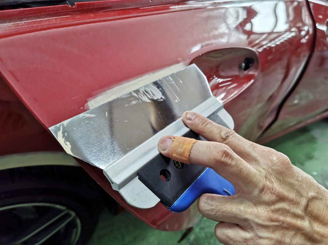 Body repair work on the Mercedes-Benz A180, surface checked and damages marked.