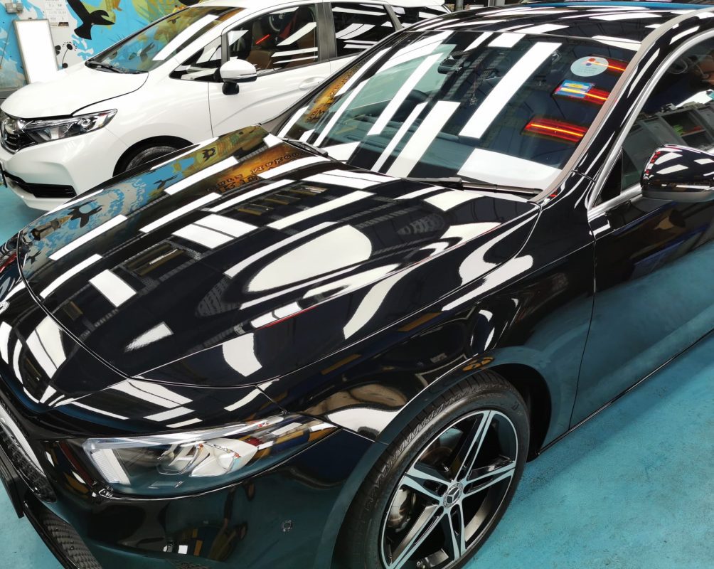 The Mercedes-Benz A180 from a side angle after the ceramic coating.