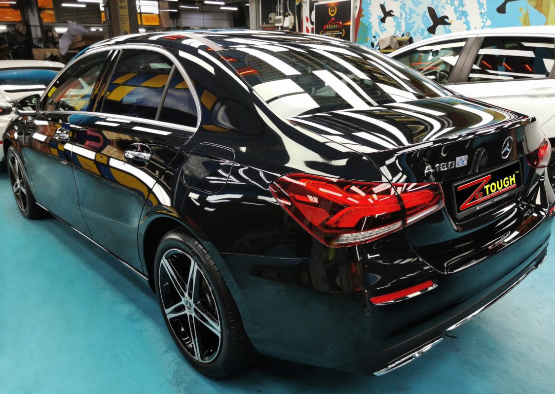 Rear quarter of the Mercedes-Benz A180, glossy and protected.