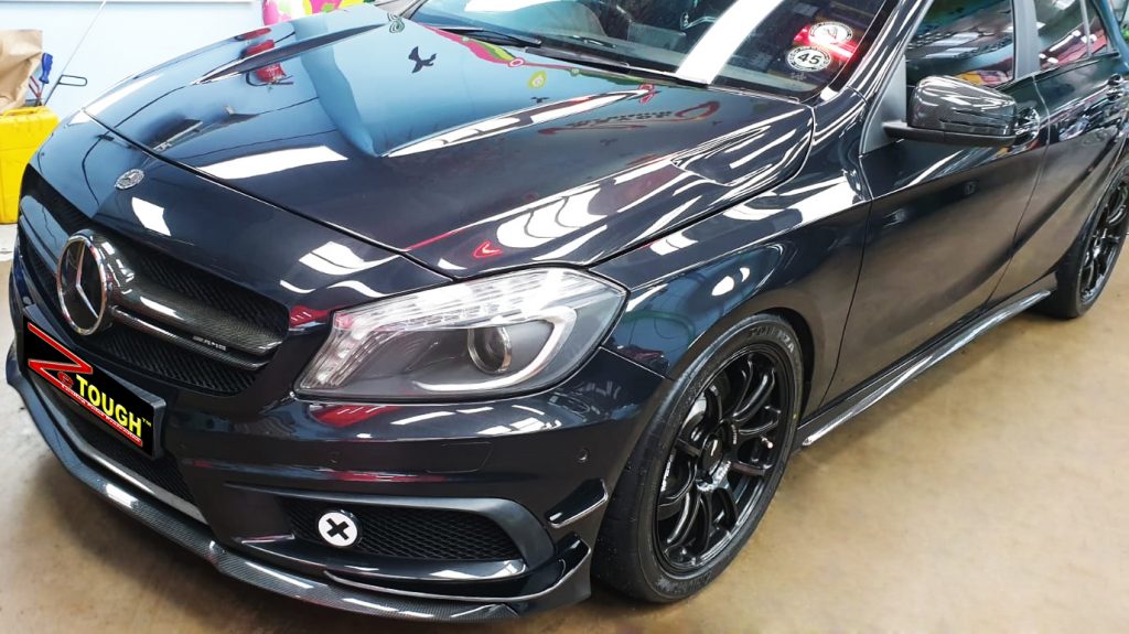 The Mercedes-Benz A45 from a side angle after the ceramic coating.