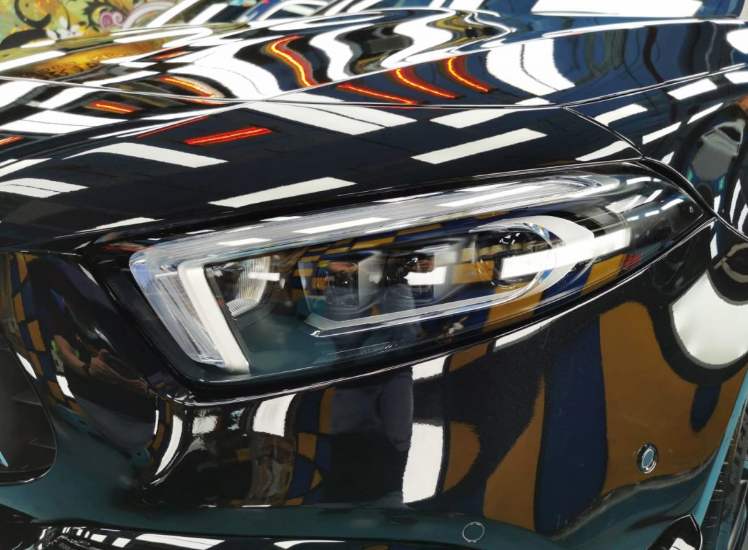 The AMG A45's coated paintwork showing clean reflections.