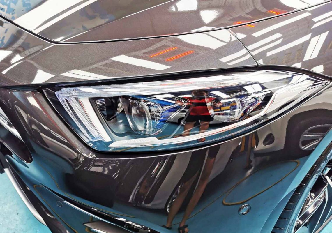 The AMG CLS53's coated paintwork showing clean reflections.