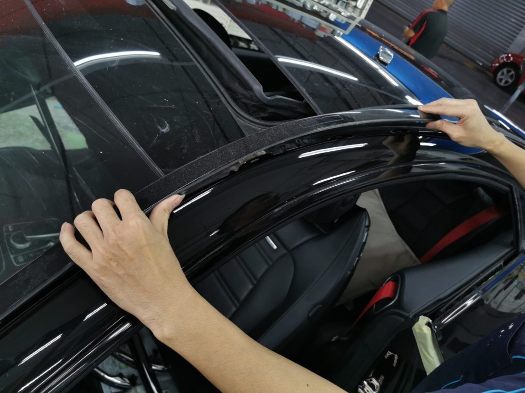 Polishing the new paint on the AMG E53 to bring up the shine.