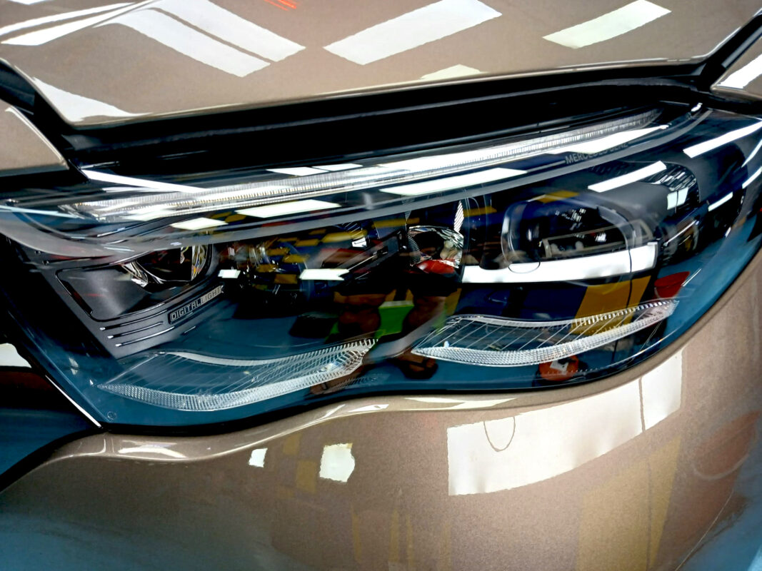 The AMG E53's coated paintwork showing clean reflections.