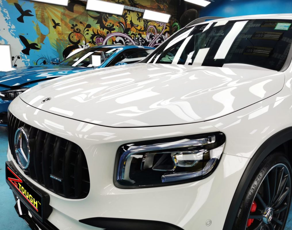The Mercedes-Benz AMG GLB35 from a side angle after the titanium coating.