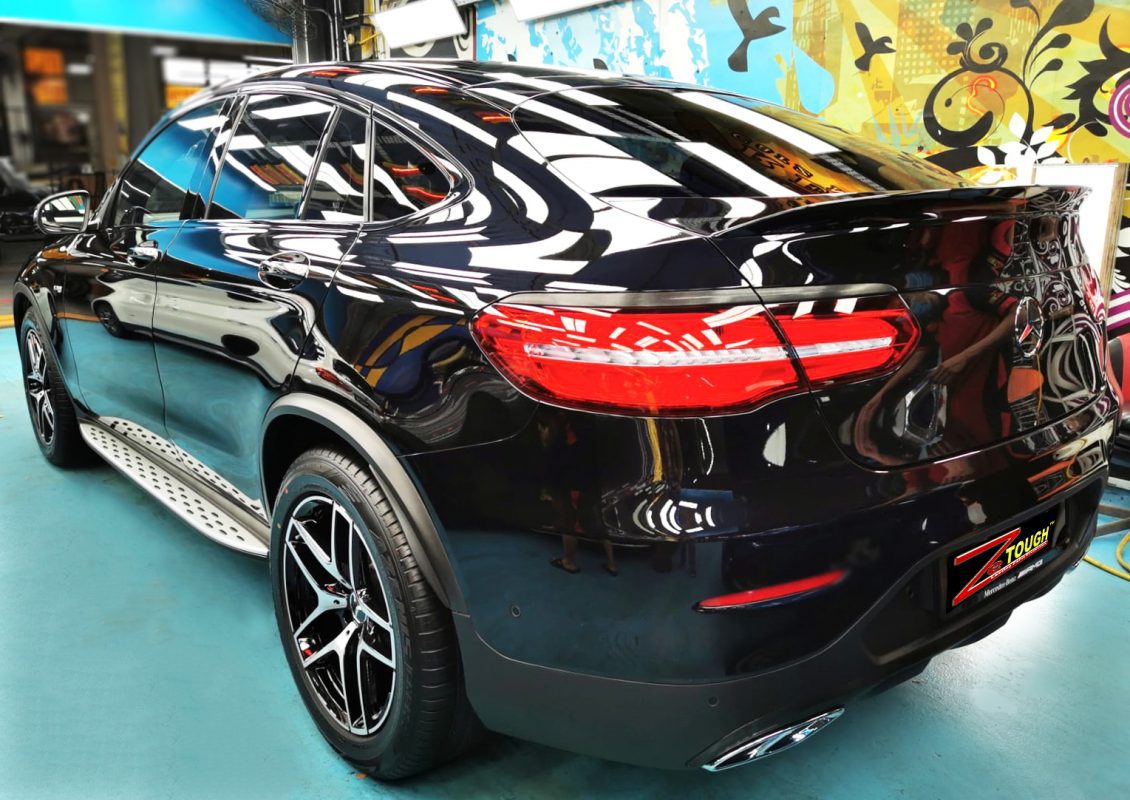Rear quarter of the Mercedes-Benz AMG GLC43, glossy and protected.