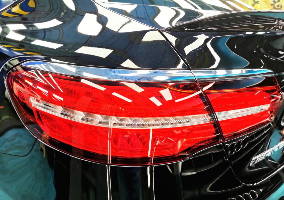 The coated bonnet of the GLC43 under workshop lighting.
