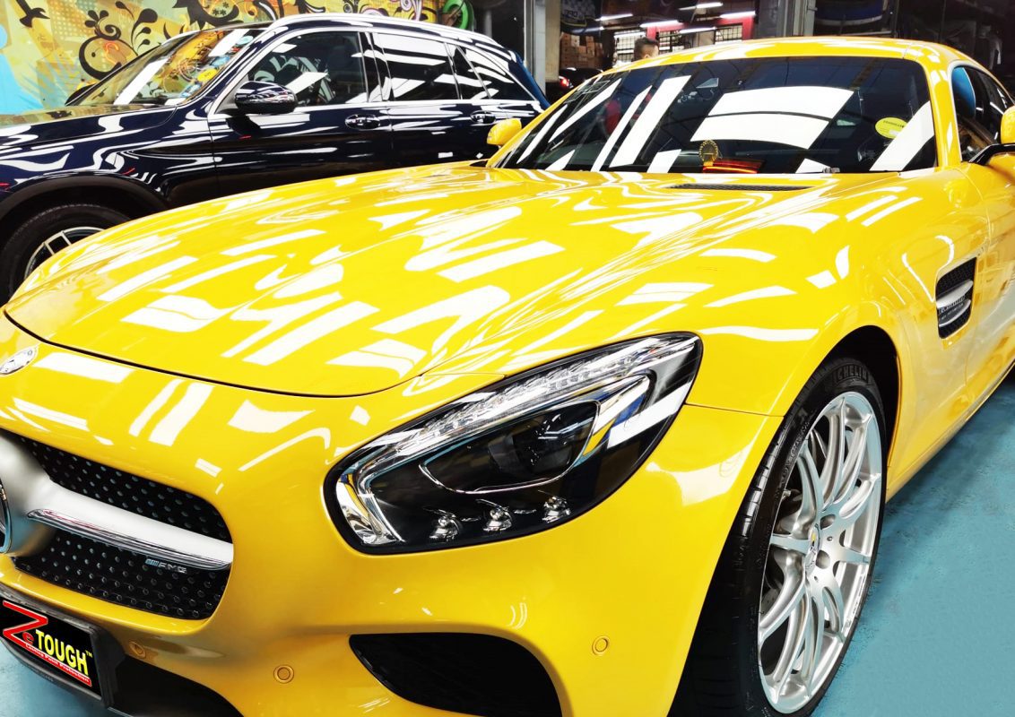 The Mercedes-Benz AMG GT from a side angle after the ceramic coating.