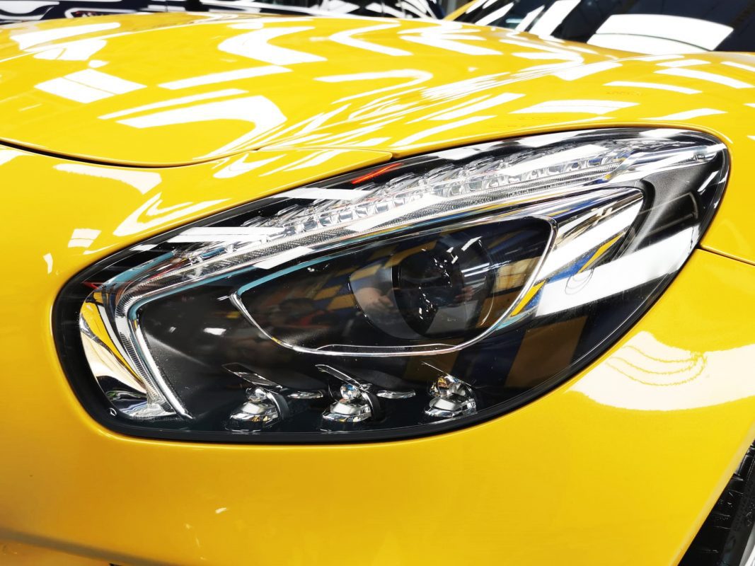 The AMG GT's coated paintwork showing clean reflections.