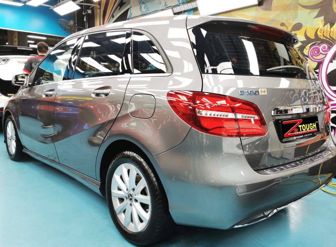 Rear quarter of the B180, glossy and protected.