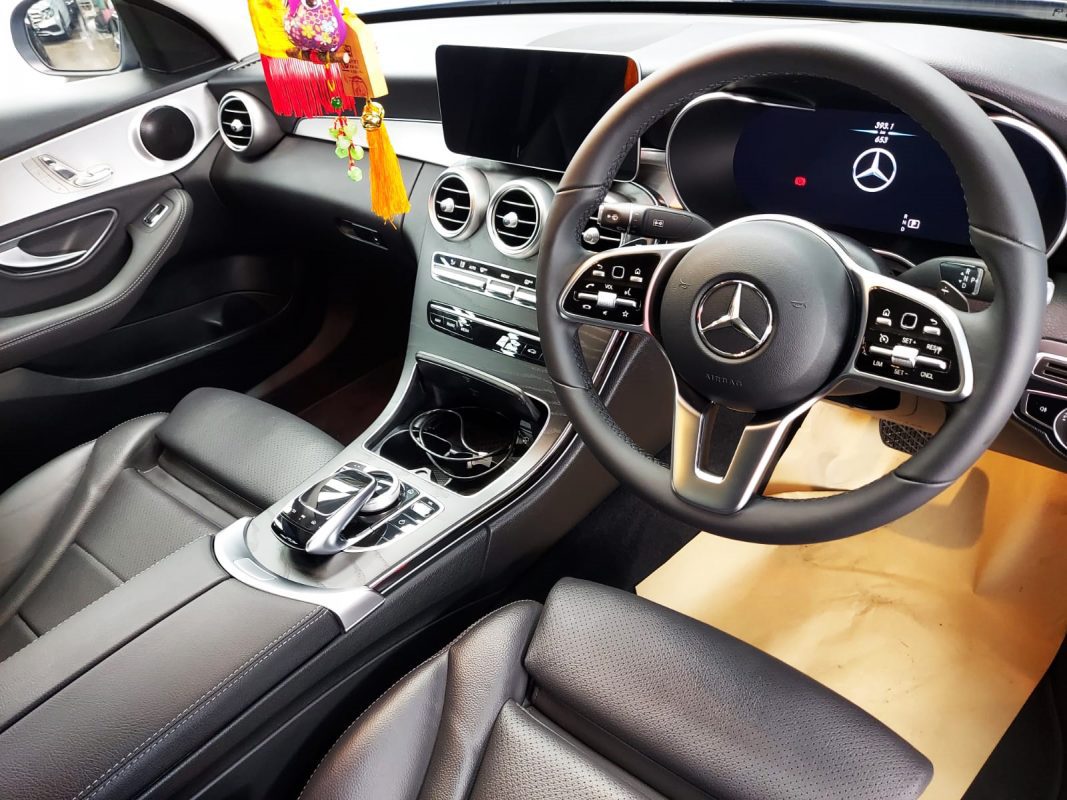 The Mercedes-Benz C160 parked in the workshop, freshly coated.