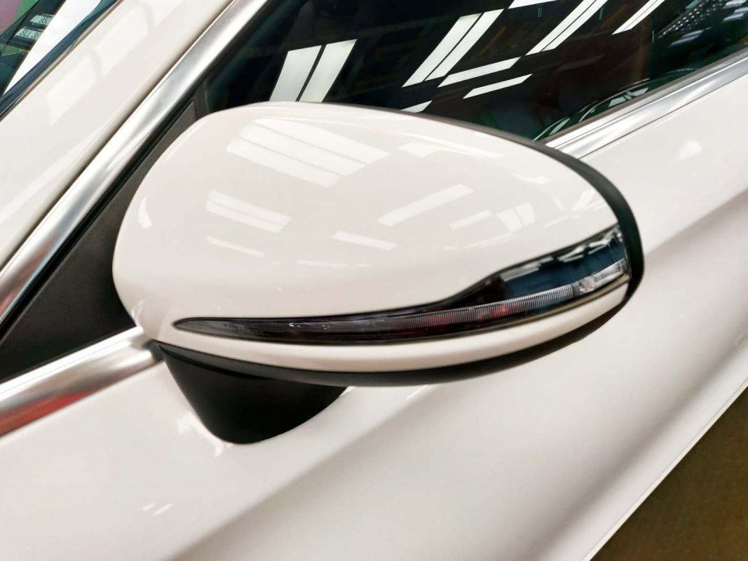 The Mercedes-Benz C180 parked in the workshop, freshly coated.