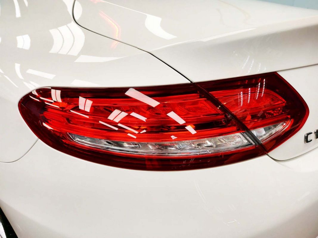 Rear quarter of the C180, glossy and protected.