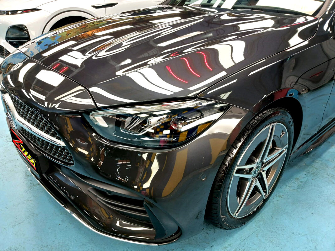 The Mercedes-Benz C180 from a side angle after the ceramic coating.