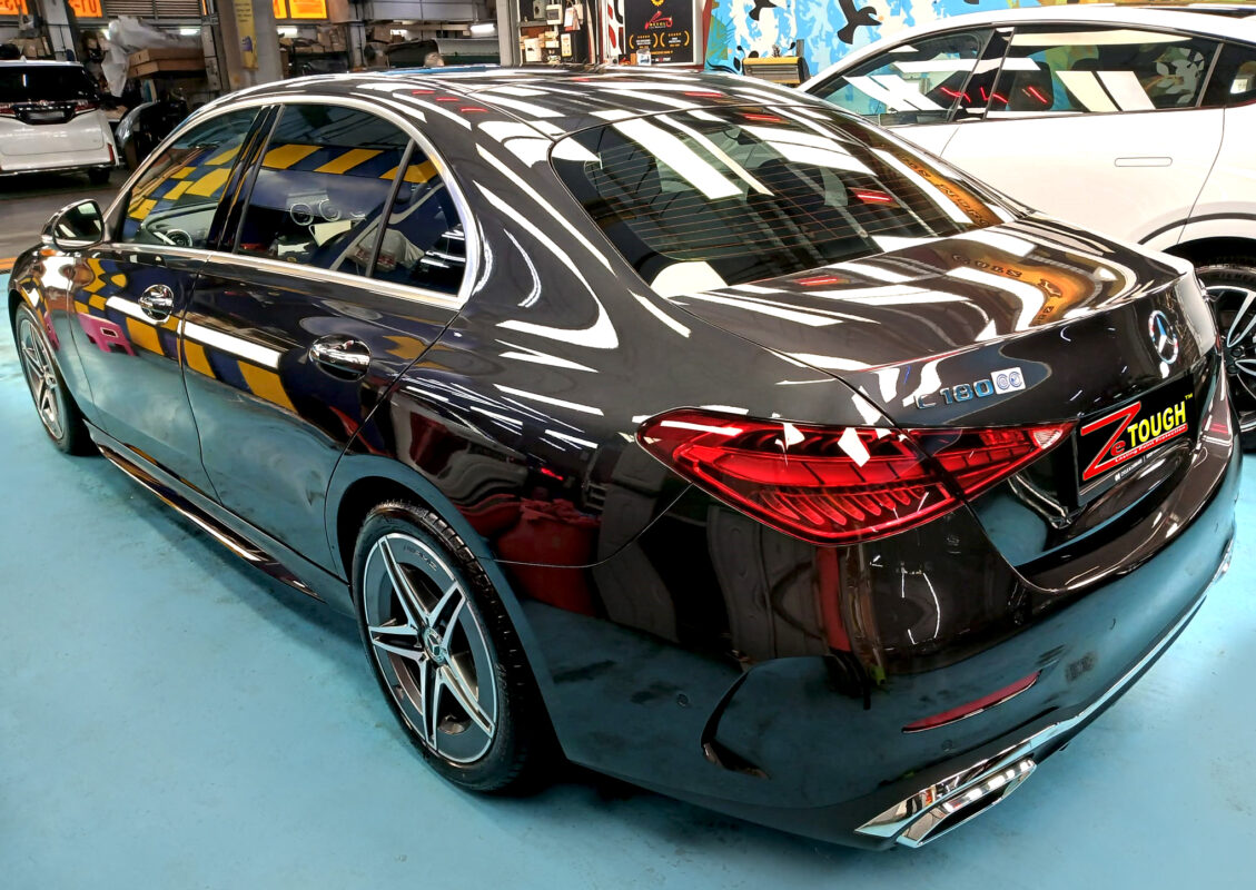 Rear quarter of the Mercedes-Benz C180, glossy and protected.