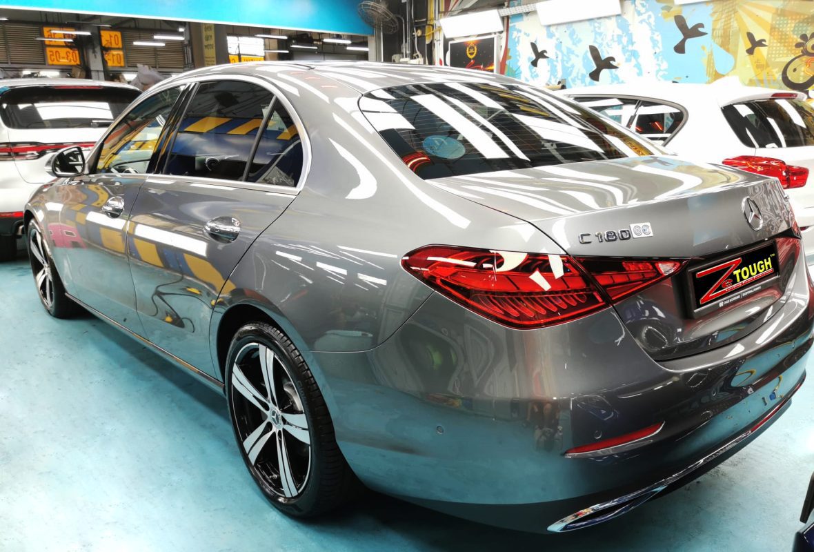 Rear quarter of the C180, glossy and protected.