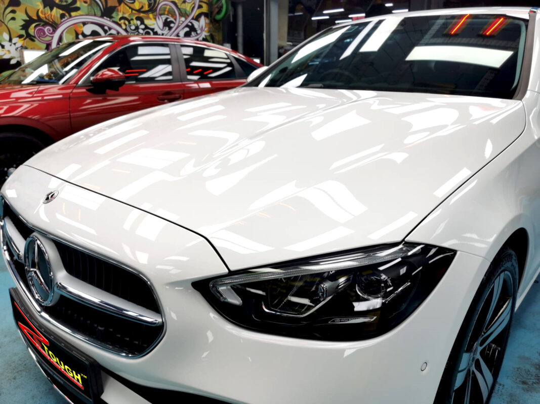 The Mercedes-Benz C180 from a side angle after the ceramic coating.