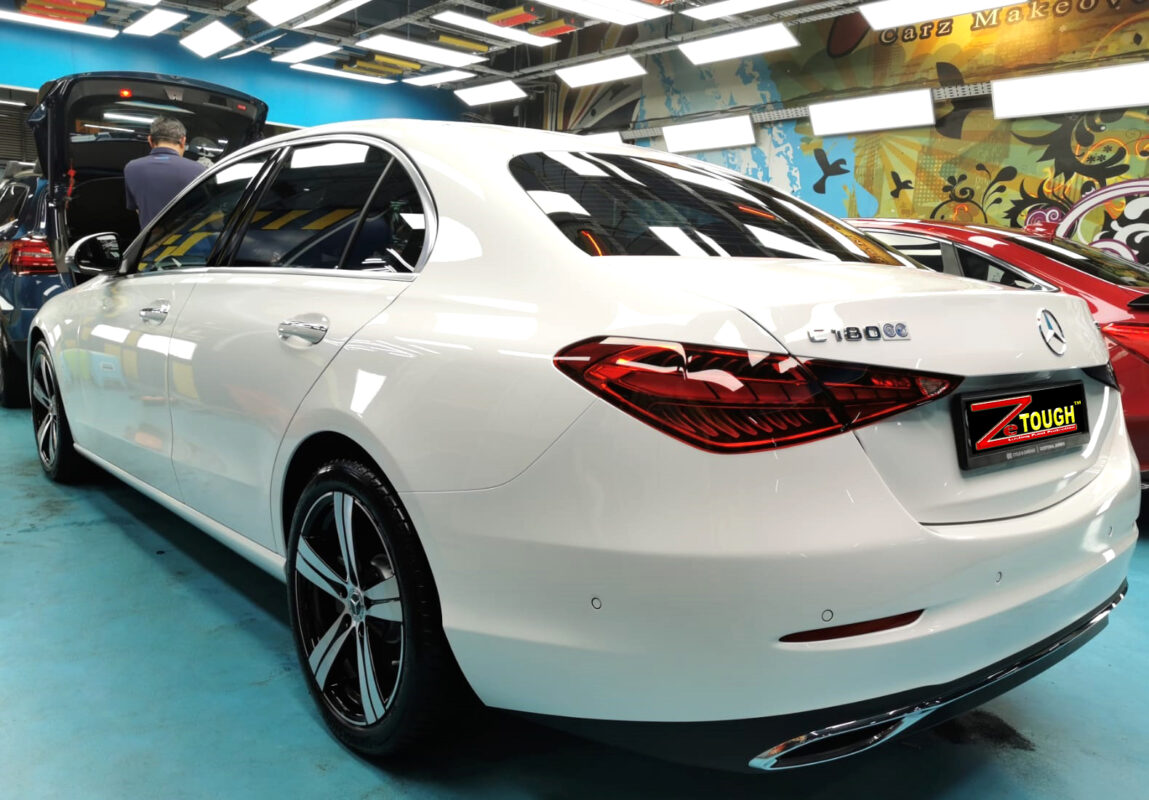 Rear quarter of the Mercedes-Benz C180, glossy and protected.