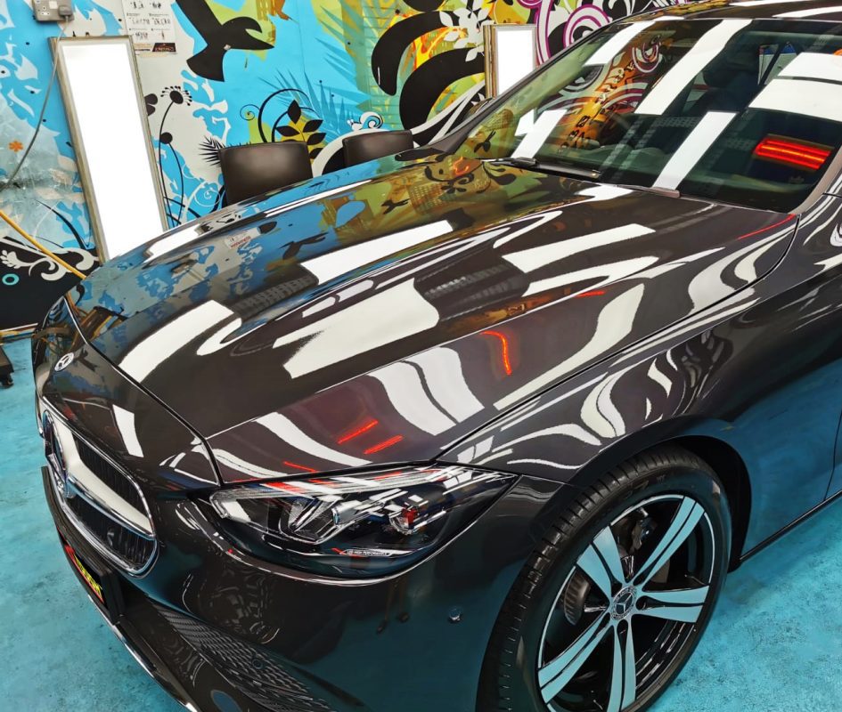 A Mercedes-Benz C180 from a side angle after the ceramic coating.