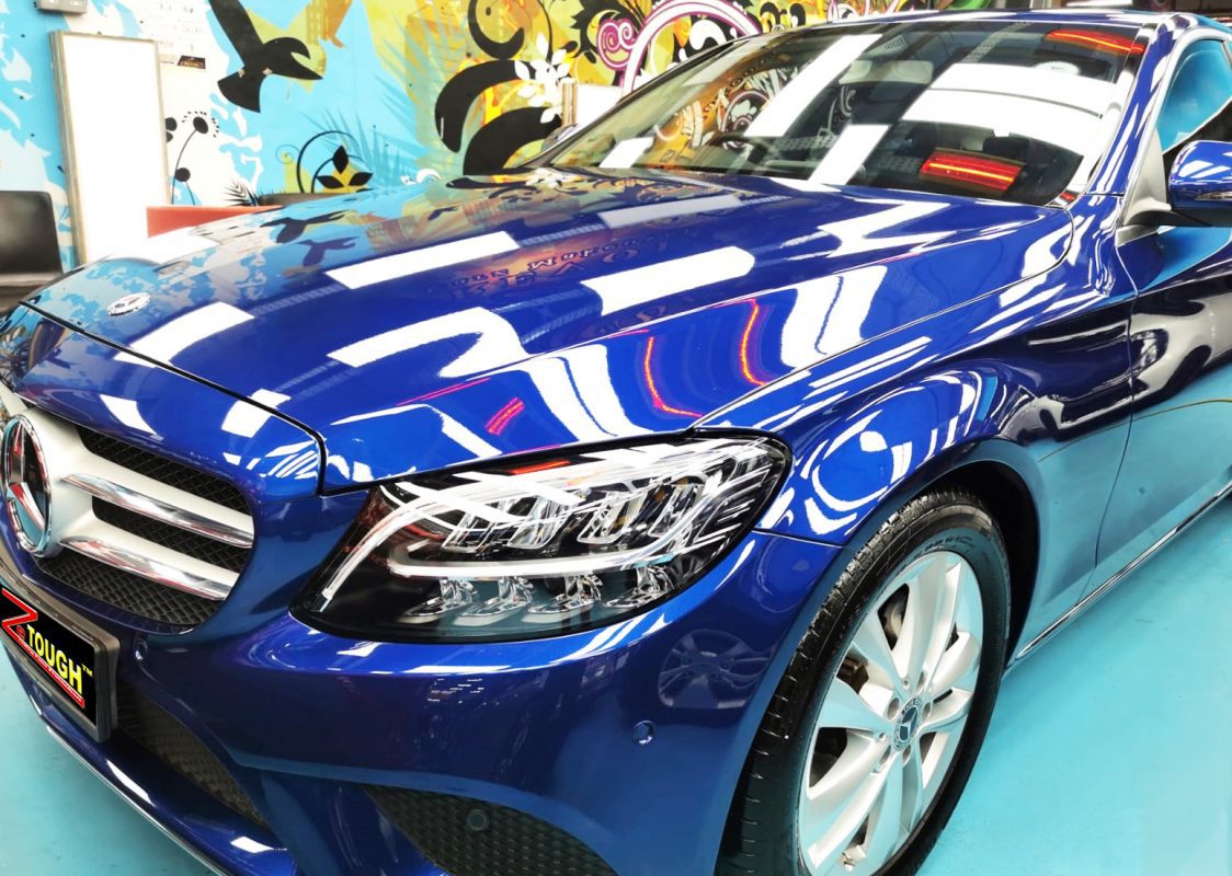 The Mercedes-Benz C180 from a side angle after the titanium coating.