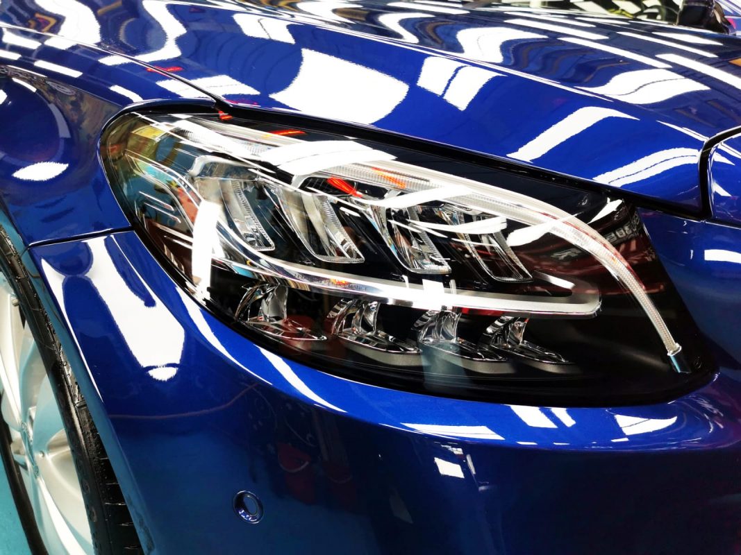 The C180's coated paintwork showing clean reflections.