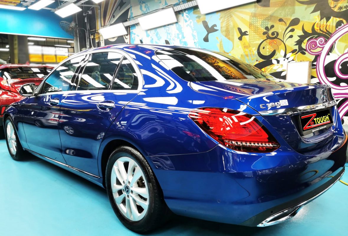 Rear quarter of the C180, glossy and protected.