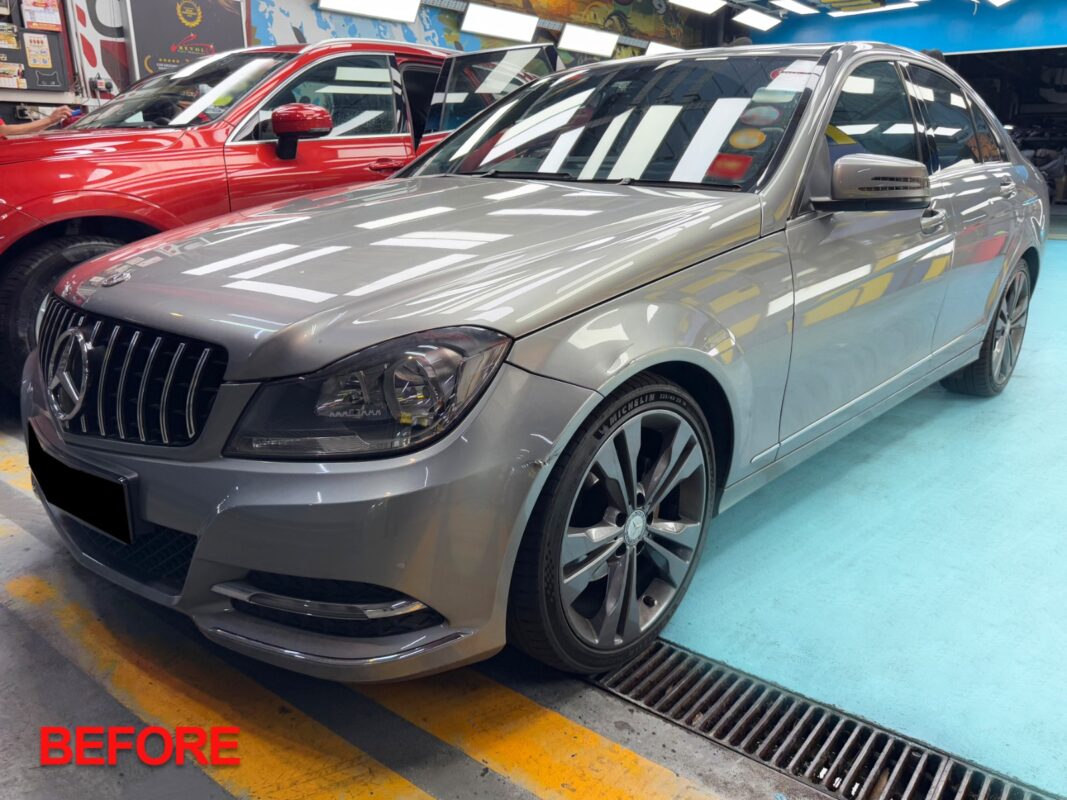 Mercedes-Benz C180 sedan, freshly resprayed and glossy.
