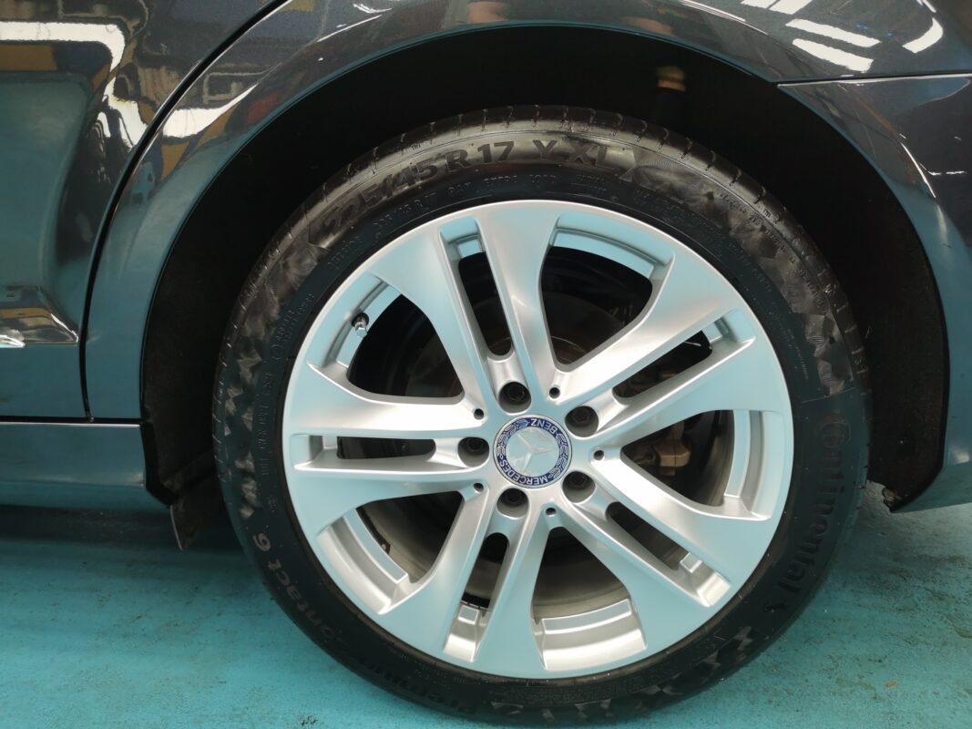 After: the same C180, resprayed to a fresh, clean finish.