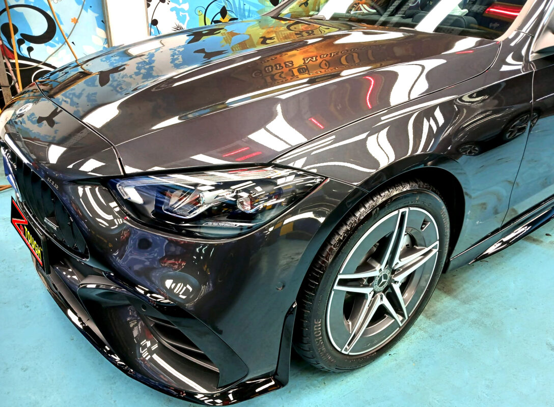 The Mercedes-Benz C180 from a side angle after the ceramic coating.