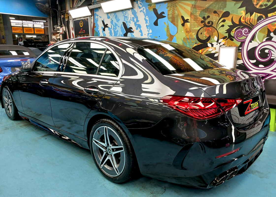 Rear quarter of the Mercedes-Benz C180, glossy and protected.
