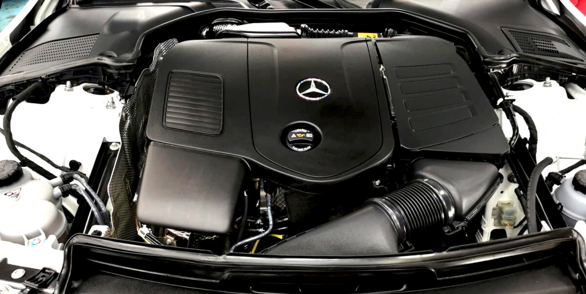 The Mercedes-Benz C180 parked in the workshop, freshly coated.