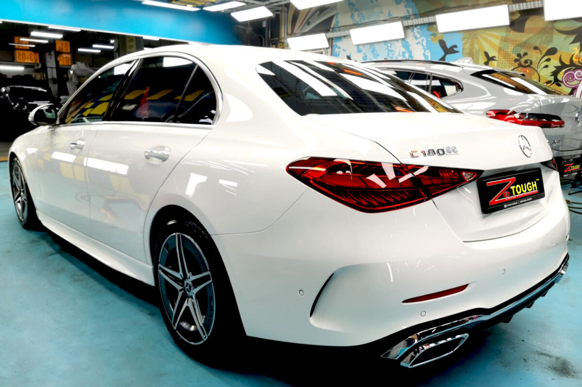 Rear quarter of the Mercedes-Benz C180, glossy and protected.
