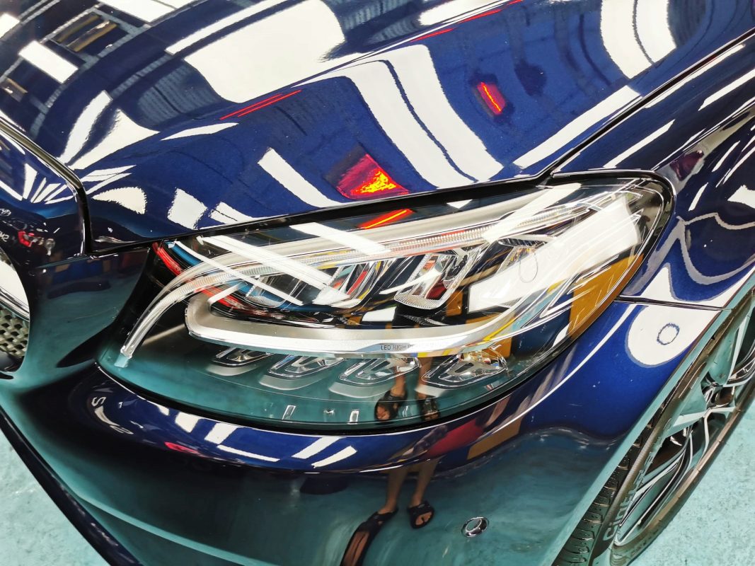 The C180's coated paintwork showing clean reflections.