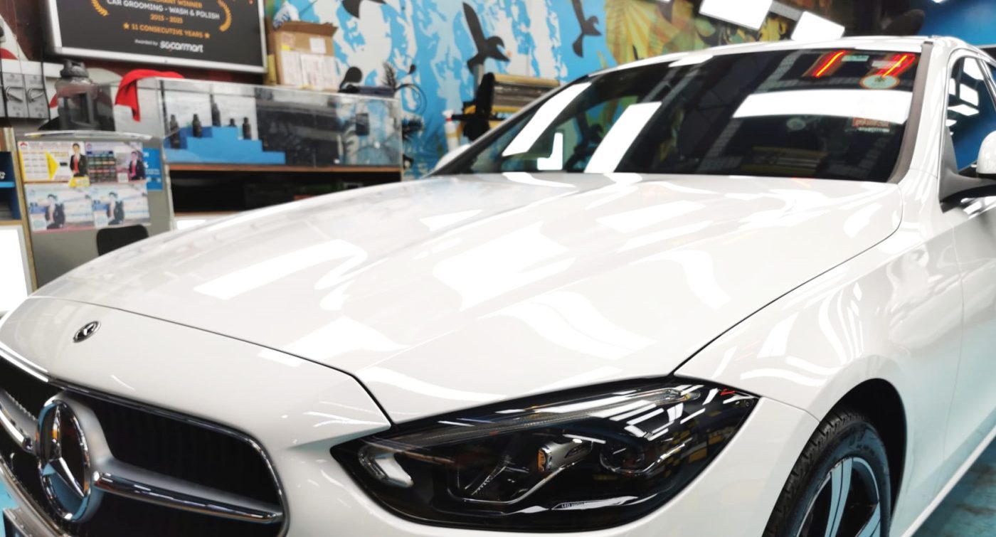 The Mercedes-Benz C180 from a side angle after the ceramic coating.