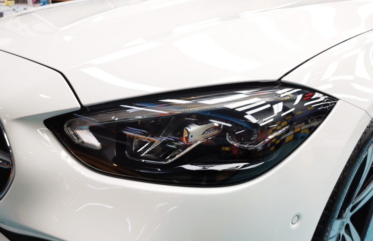 The C180's coated paintwork showing clean reflections.