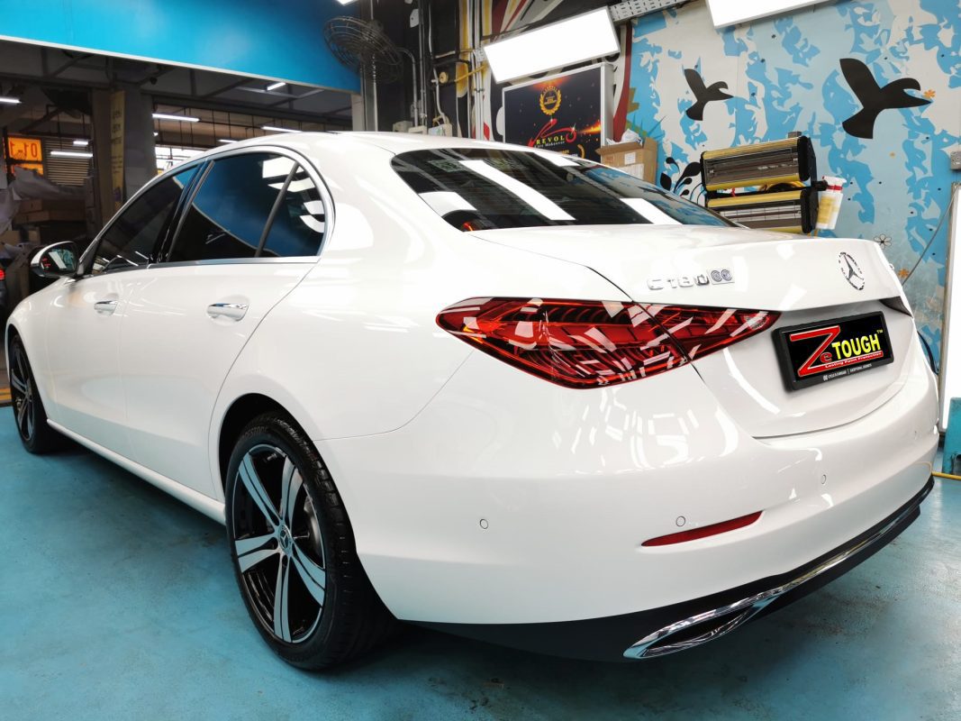 Rear quarter of the Mercedes-Benz C180, glossy and protected.