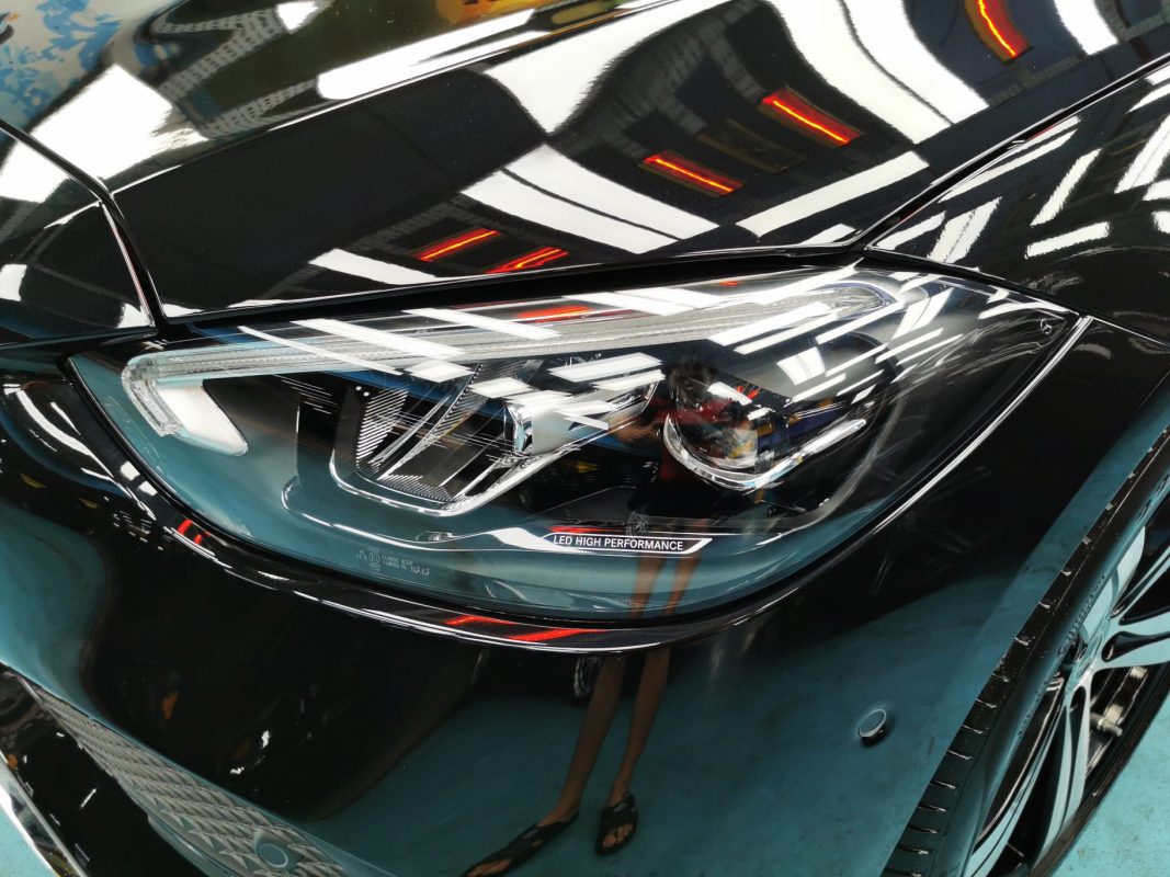 The C180's coated paintwork showing clean reflections.
