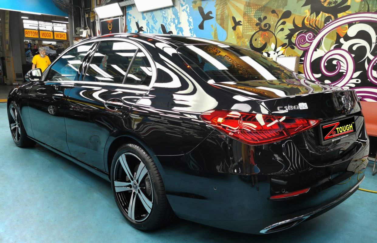 Rear quarter of the Mercedes-Benz C180, glossy and protected.