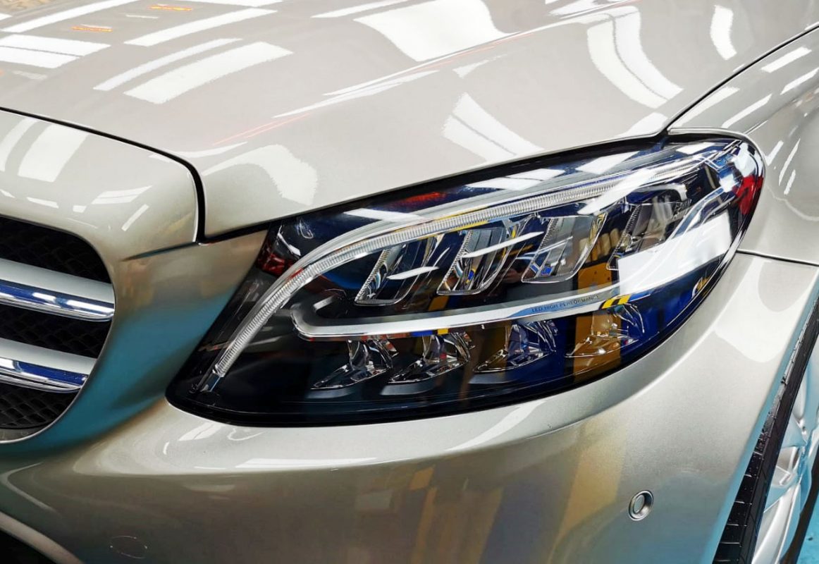 The C180's coated paintwork showing clean reflections.